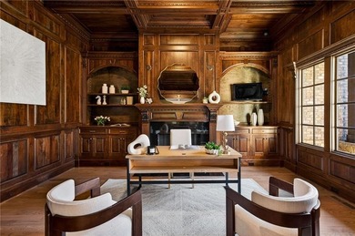 Perfectly positioned to capture sweeping views of the lake and on Manor Golf and Country Club in Georgia - for sale on GolfHomes.com, golf home, golf lot