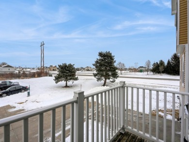 Welcome home to this stunning 2-bedroom, 2.5-bathroom townhome on Otter Creek Golf Course in Iowa - for sale on GolfHomes.com, golf home, golf lot