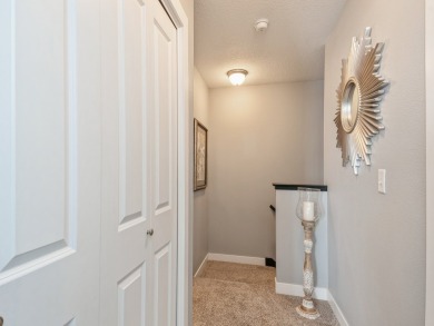 Welcome home to this stunning 2-bedroom, 2.5-bathroom townhome on Otter Creek Golf Course in Iowa - for sale on GolfHomes.com, golf home, golf lot