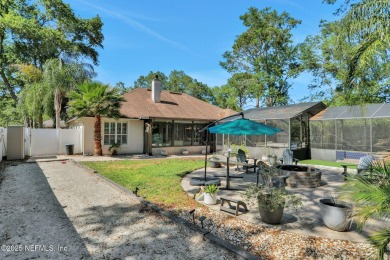 Enjoy the best of the Florida lifestyle in this spacious 4BR/3BA on Julington Creek Golf Club in Florida - for sale on GolfHomes.com, golf home, golf lot