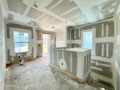 Don't miss out on the chance to customize your dream townhome in on Amelia National Golf and Country Club in Florida - for sale on GolfHomes.com, golf home, golf lot