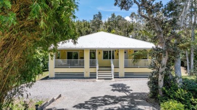 Step into 99-1919 Pukeawe Circle, a fully-furnished three on Volcano Golf and Country Club in Hawaii - for sale on GolfHomes.com, golf home, golf lot