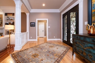 This stunning custom home on the prestigious Founder's Course of on Chenal Country Club - Bear Den Mountain in Arkansas - for sale on GolfHomes.com, golf home, golf lot