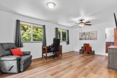 Step into 99-1919 Pukeawe Circle, a fully-furnished three on Volcano Golf and Country Club in Hawaii - for sale on GolfHomes.com, golf home, golf lot