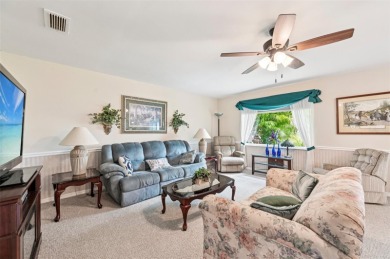 Enjoy effortless Florida living in this fully furnished on Falcon Watch Golf Club in Florida - for sale on GolfHomes.com, golf home, golf lot