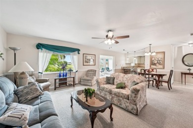 Enjoy effortless Florida living in this fully furnished on Falcon Watch Golf Club in Florida - for sale on GolfHomes.com, golf home, golf lot