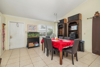 Welcome to this 3 bedroom, 2-bath single-family home located in on The Golf Club of Jupiter in Florida - for sale on GolfHomes.com, golf home, golf lot
