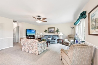 Enjoy effortless Florida living in this fully furnished on Falcon Watch Golf Club in Florida - for sale on GolfHomes.com, golf home, golf lot