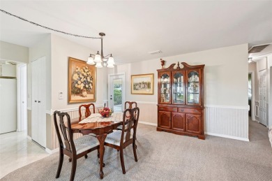 Enjoy effortless Florida living in this fully furnished on Falcon Watch Golf Club in Florida - for sale on GolfHomes.com, golf home, golf lot