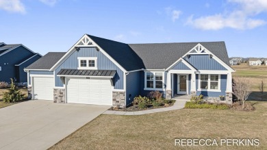 Luxury living at Macatawa Legends! Stunning home overlooking the on The Macatwa Legends Golf Course in Michigan - for sale on GolfHomes.com, golf home, golf lot