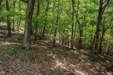 Here's your chance to snag a prime 0.89-acre corner lot in Bent on Bent Tree Golf Course in Georgia - for sale on GolfHomes.com, golf home, golf lot