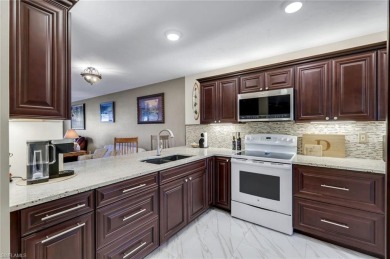 Beautiful property video available. Ground-floor condo in Abbey on Imperial Golf Club in Florida - for sale on GolfHomes.com, golf home, golf lot