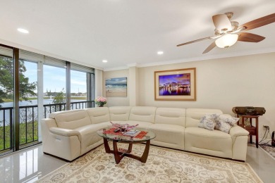 Enjoy a full lake view from extended living area in this 2/2 on Fountains Golf and Country Club in Florida - for sale on GolfHomes.com, golf home, golf lot