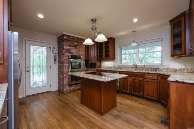 Nestled in the woods at the end of a private drive, and close to on Country Club of Little Rock in Arkansas - for sale on GolfHomes.com, golf home, golf lot