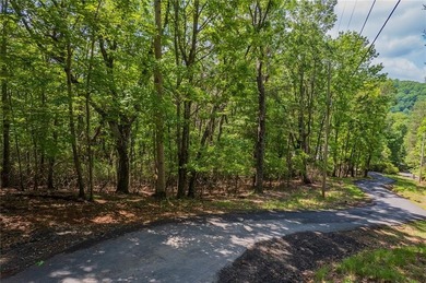 Here's your chance to snag a prime 0.89-acre corner lot in Bent on Bent Tree Golf Course in Georgia - for sale on GolfHomes.com, golf home, golf lot
