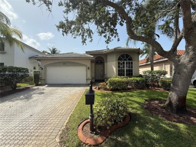 Gorgeous single-story Mediterranean-style pool home in the gated on TPC Eagle Trace in Florida - for sale on GolfHomes.com, golf home, golf lot