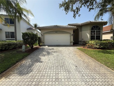 Gorgeous single-story Mediterranean-style pool home in the gated on TPC Eagle Trace in Florida - for sale on GolfHomes.com, golf home, golf lot