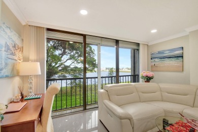 Enjoy a full lake view from extended living area in this 2/2 on Fountains Golf and Country Club in Florida - for sale on GolfHomes.com, golf home, golf lot