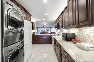 Beautiful property video available. Ground-floor condo in Abbey on Imperial Golf Club in Florida - for sale on GolfHomes.com, golf home, golf lot