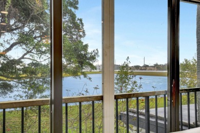 Enjoy a full lake view from extended living area in this 2/2 on Fountains Golf and Country Club in Florida - for sale on GolfHomes.com, golf home, golf lot