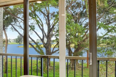 Enjoy a full lake view from extended living area in this 2/2 on Fountains Golf and Country Club in Florida - for sale on GolfHomes.com, golf home, golf lot