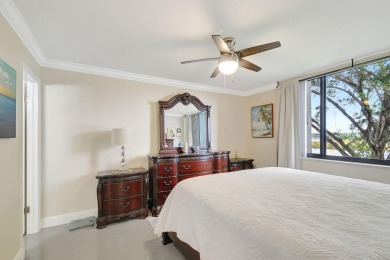 Enjoy a full lake view from extended living area in this 2/2 on Fountains Golf and Country Club in Florida - for sale on GolfHomes.com, golf home, golf lot