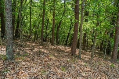 Here's your chance to snag a prime 0.89-acre corner lot in Bent on Bent Tree Golf Course in Georgia - for sale on GolfHomes.com, golf home, golf lot