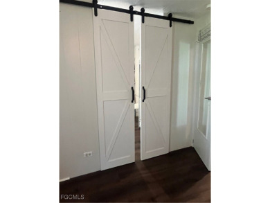 Gorgeous, updated home in much desired Tamiami Village. This on Six Lakes Country Club in Florida - for sale on GolfHomes.com, golf home, golf lot