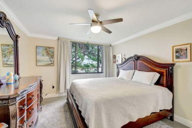 Enjoy a full lake view from extended living area in this 2/2 on Fountains Golf and Country Club in Florida - for sale on GolfHomes.com, golf home, golf lot