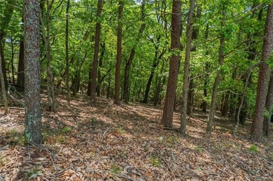 Here's your chance to snag a prime 0.89-acre corner lot in Bent on Bent Tree Golf Course in Georgia - for sale on GolfHomes.com, golf home, golf lot