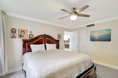 Enjoy a full lake view from extended living area in this 2/2 on Fountains Golf and Country Club in Florida - for sale on GolfHomes.com, golf home, golf lot