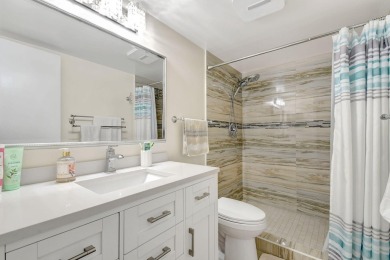 Enjoy a full lake view from extended living area in this 2/2 on Fountains Golf and Country Club in Florida - for sale on GolfHomes.com, golf home, golf lot