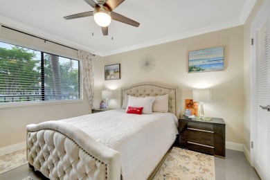 Enjoy a full lake view from extended living area in this 2/2 on Fountains Golf and Country Club in Florida - for sale on GolfHomes.com, golf home, golf lot