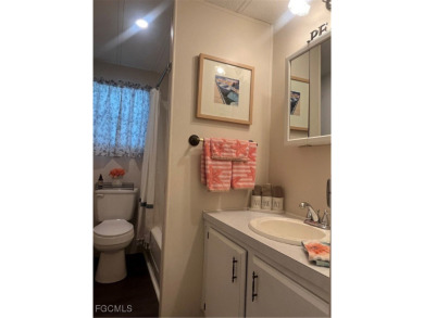 Gorgeous, updated home in much desired Tamiami Village. This on Six Lakes Country Club in Florida - for sale on GolfHomes.com, golf home, golf lot