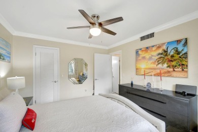 Enjoy a full lake view from extended living area in this 2/2 on Fountains Golf and Country Club in Florida - for sale on GolfHomes.com, golf home, golf lot