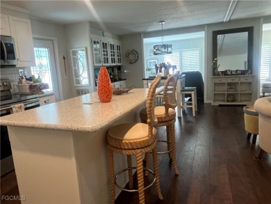Gorgeous, updated home in much desired Tamiami Village. This on Six Lakes Country Club in Florida - for sale on GolfHomes.com, golf home, golf lot