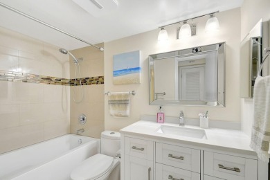 Enjoy a full lake view from extended living area in this 2/2 on Fountains Golf and Country Club in Florida - for sale on GolfHomes.com, golf home, golf lot