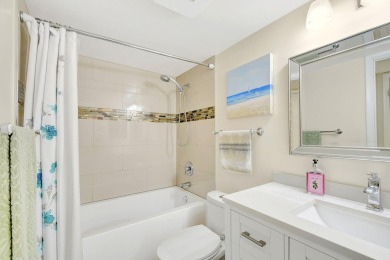 Enjoy a full lake view from extended living area in this 2/2 on Fountains Golf and Country Club in Florida - for sale on GolfHomes.com, golf home, golf lot