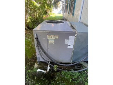 Gorgeous, updated home in much desired Tamiami Village. This on Six Lakes Country Club in Florida - for sale on GolfHomes.com, golf home, golf lot