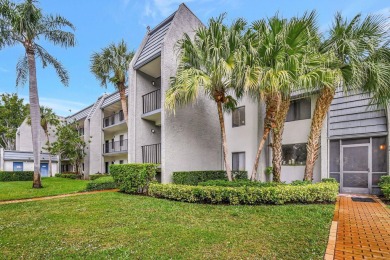 Enjoy a full lake view from extended living area in this 2/2 on Fountains Golf and Country Club in Florida - for sale on GolfHomes.com, golf home, golf lot
