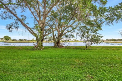 Enjoy a full lake view from extended living area in this 2/2 on Fountains Golf and Country Club in Florida - for sale on GolfHomes.com, golf home, golf lot