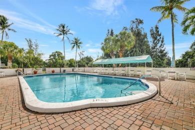 Enjoy a full lake view from extended living area in this 2/2 on Fountains Golf and Country Club in Florida - for sale on GolfHomes.com, golf home, golf lot