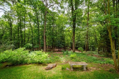 Nestled in the woods at the end of a private drive, and close to on Country Club of Little Rock in Arkansas - for sale on GolfHomes.com, golf home, golf lot