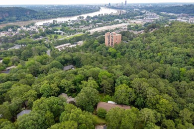 Nestled in the woods at the end of a private drive, and close to on Country Club of Little Rock in Arkansas - for sale on GolfHomes.com, golf home, golf lot