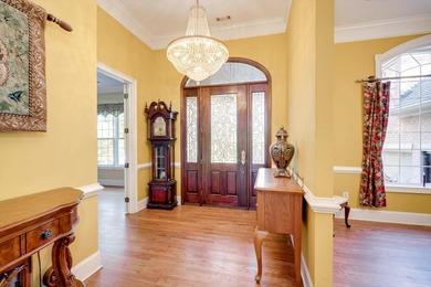 Located in an exclusive gated community this beautiful custom on The Reserve Club At Woodside Plantation in South Carolina - for sale on GolfHomes.com, golf home, golf lot