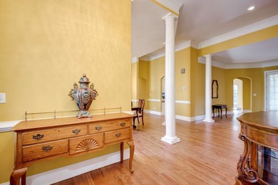 Located in an exclusive gated community this beautiful custom on The Reserve Club At Woodside Plantation in South Carolina - for sale on GolfHomes.com, golf home, golf lot