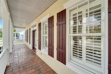 Welcome to 528 Islebay Blvd, a captivating Key West-style home on Apollo Beach Golf and Sea Club in Florida - for sale on GolfHomes.com, golf home, golf lot