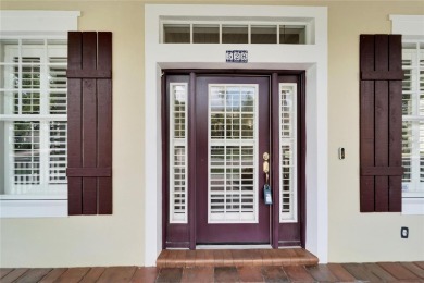 Welcome to 528 Islebay Blvd, a captivating Key West-style home on Apollo Beach Golf and Sea Club in Florida - for sale on GolfHomes.com, golf home, golf lot