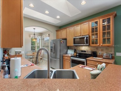 Excellent VALUE on this BEAUTIFUL CONSERVATION LOT HOME with the on Stonegate Golf Club in Florida - for sale on GolfHomes.com, golf home, golf lot