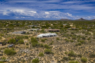 Luxurious custom estate on a prime 1-acre lot in northeast on Whisper Rock Golf Club  in Arizona - for sale on GolfHomes.com, golf home, golf lot